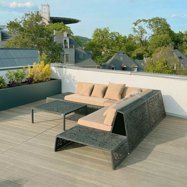 Image of rear of Bios Lava Lounge modular garden corner sofa in black basalt fibre and epoxy resin