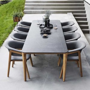 Luna & Aspect garden dining furniture has a stylish & hardwearing ceramic garden table & modern teak chair by Cane-line all-weather furniture