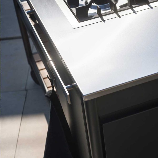 Image of detail of Norma gas BBQ's brushed stainless steel upper surface by RODA
