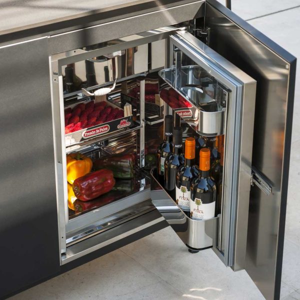 Image of Roda Norma outdoor fridge with door open, showing shelves full of fine wines and food