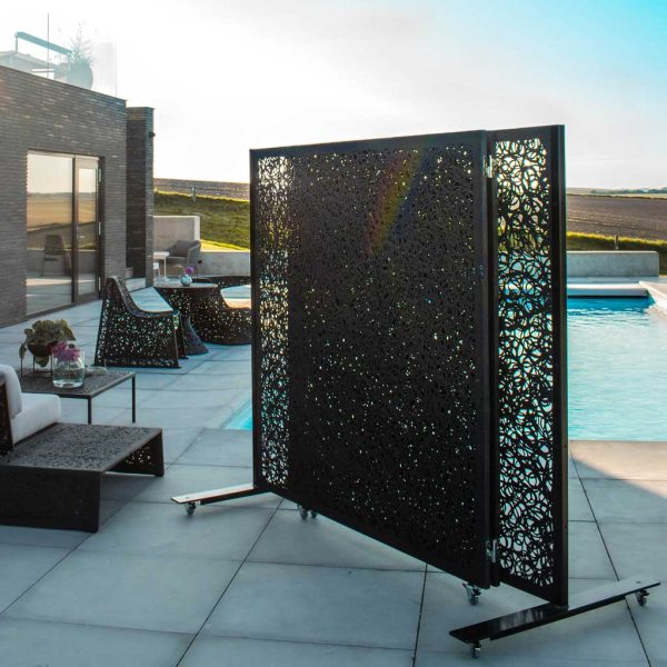 Image of black lava outdoor screen on wheels by Unknown Furniture on poolside