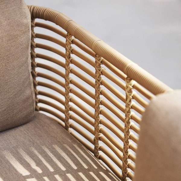 Image of shadow being cast through the cane-effect back of Sense garden sofa by Cane-line