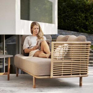 Sense cane garden sofa & outdoor lounge chair are a chic exterior lounge set with natural aesthetics by Cane-line modern garden furniture.