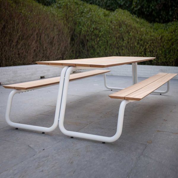 Image of The Table modern white picnic table and benches with tubular steel frame and afzelia hardwood surfaces by Wünder