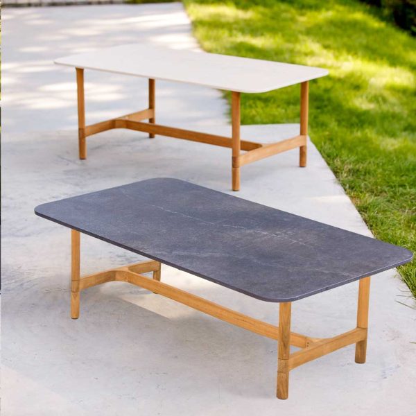 Image of pair of Twist teak coffee tables with ceramic tops by Cane-line garden furniture