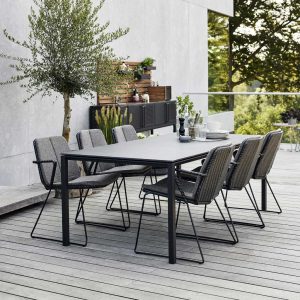 Vision modern garden chair is a stackable outdoor armchair in all weather furniture materials from Caneline chic exterior furniture, Denmark.