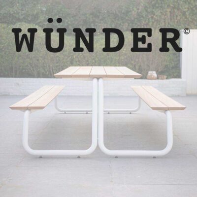 Image of Wunder logo superimposed over image of The Table picnic table & benches