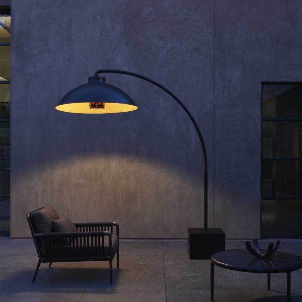 Nighttime shot of Heatsail Dome heater shown on minimalist outdoor terrace