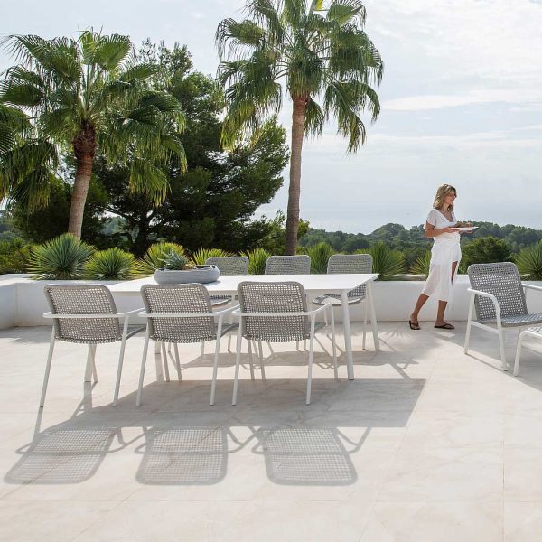 Image of Mediterranean terrace overlooking the sea, with Durham luxury aluminium garden furniture in white finish