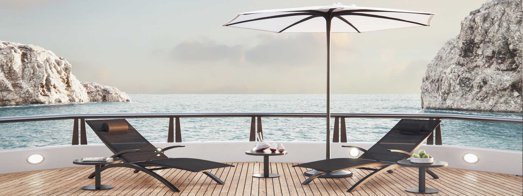 Photo showing O-Zon 50 side table and sun loungers on aft deck of superyacht