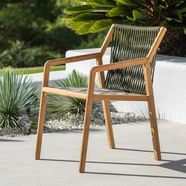 Image of Ritz teak garden dining chair with khaki Polyolefin belt seat and back on sunny terrace
