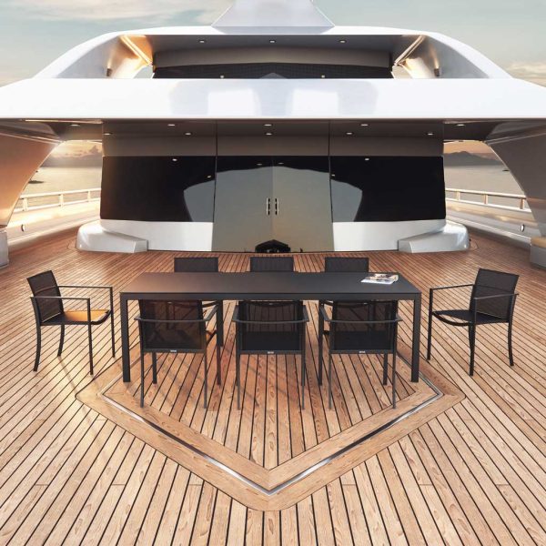 Image of black Taboela garden able and O-ZON garden chairs on aft deck of superyacht