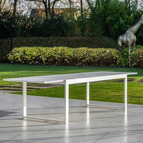 Image of extended Vigo XL white garden table with graduario marble-effect ceramic table top