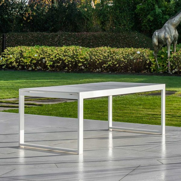 Image of closed Vigo XL extending garden dining table with white frame and graduario marble effect ceramic table top