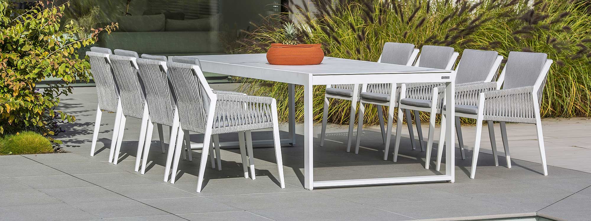 Vigo XL extending garden table is a ceramic dining table in modern outdoor table materials by Jati & Kebon luxury garden furniture company.