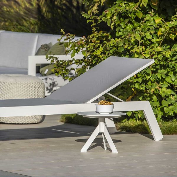 Image of white Vigo XL minimalist sun lounger, showing small wheels hidden in the back legs
