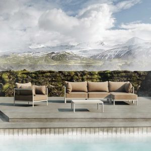 Image of Oiside 45 modular outdoor sofa on wooden decked poolside with snowy mountains in the background
