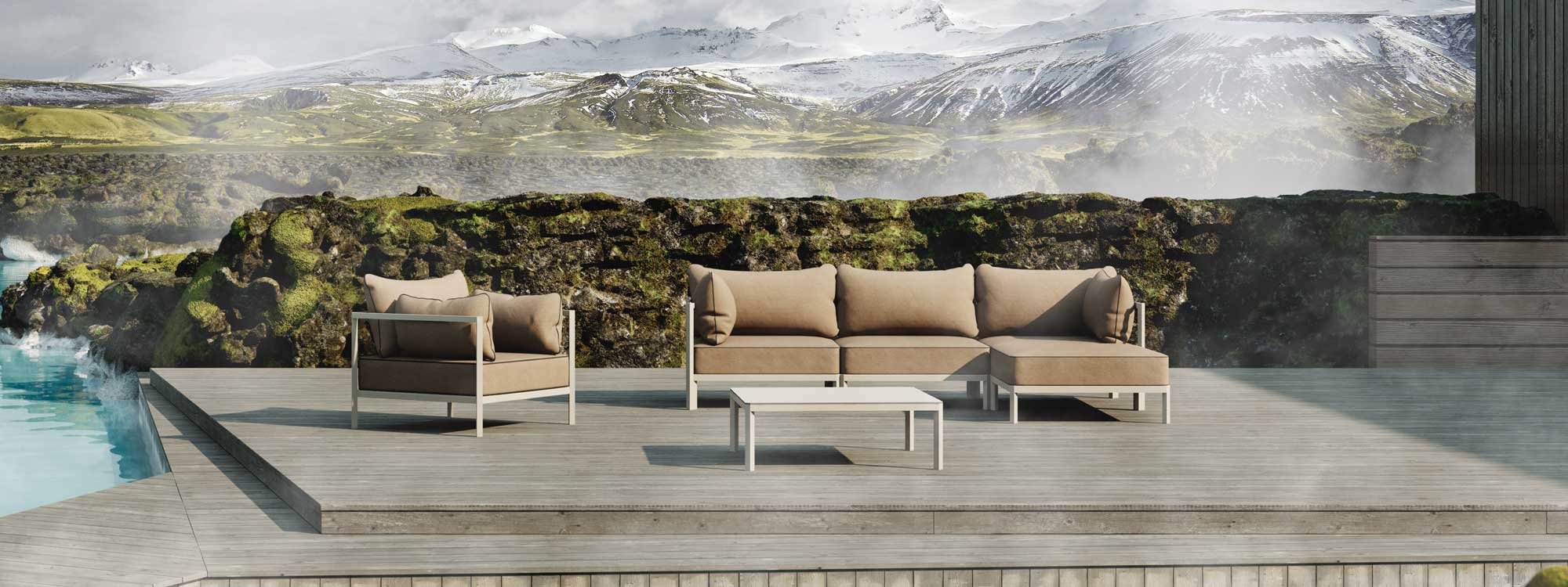 Image of Oiside 45 modular garden sofa with white frame and light brown cushions, shown on decked poolside with snowy mountains in the background