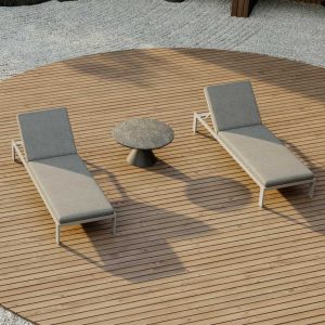 Image of pair of Oiside Beam sun loungers on circular wooden deck, surrounded by carefully raked gravel of a Japanese garden