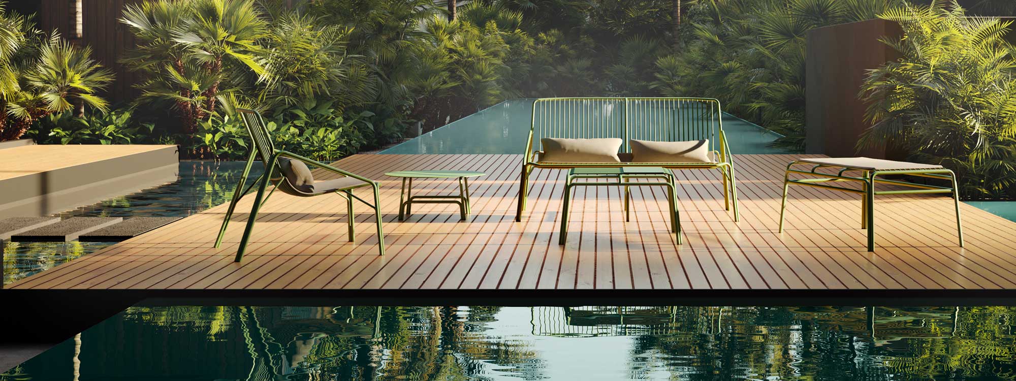 Image of Oiside No 12 green outdoor lounge furniture on wooden deck, surrounded by still water and exotic plants