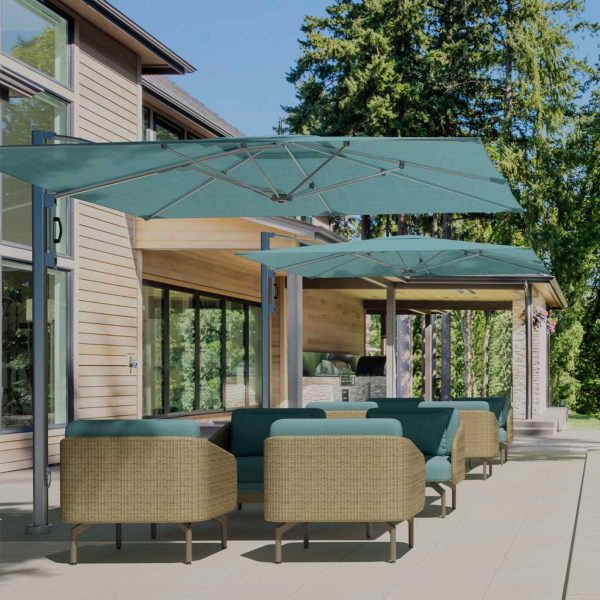 Image of light blue Tuuci parasols with polished aluminum mast and ribs on terrace above comfortable outdoor lounge furniture