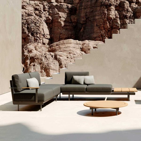 Image of Oiside Pendant modern garden corner sofa, shown on hot terrace with arid sides of a canyon in the background