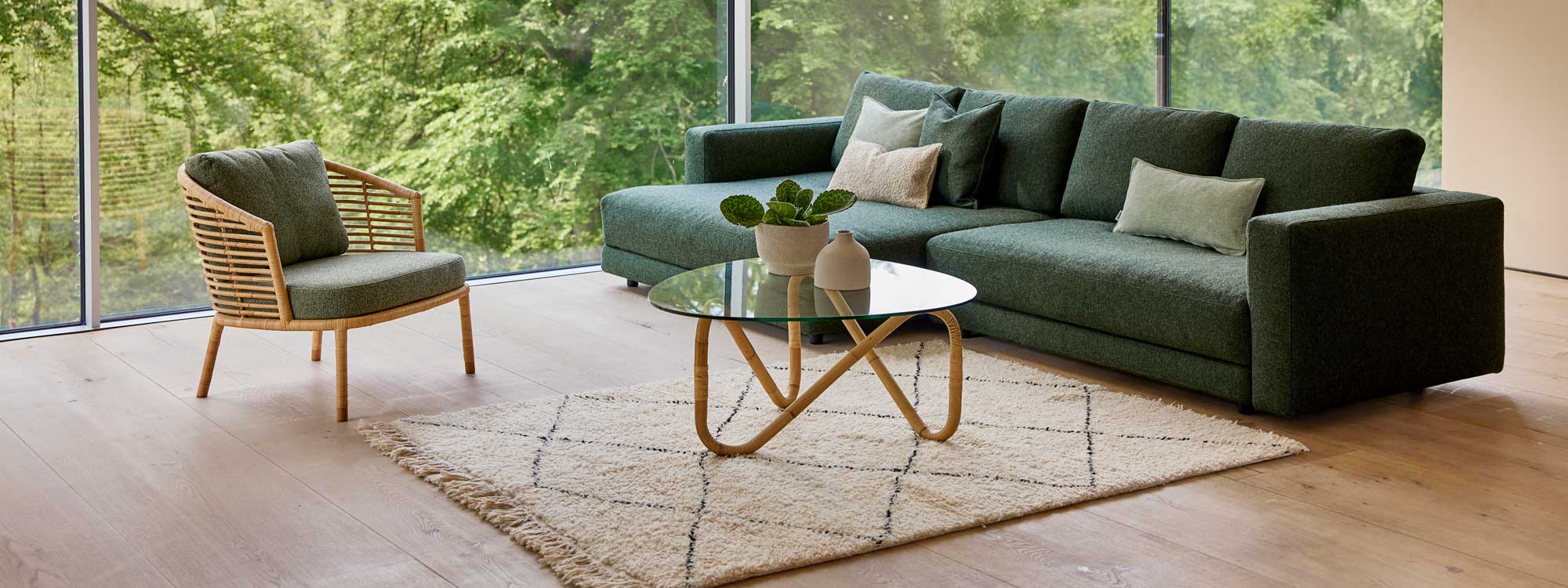 Image of Scale twin sofa and daybed in Dark-green Cane-line Zen fabric with Wave coffee table in front