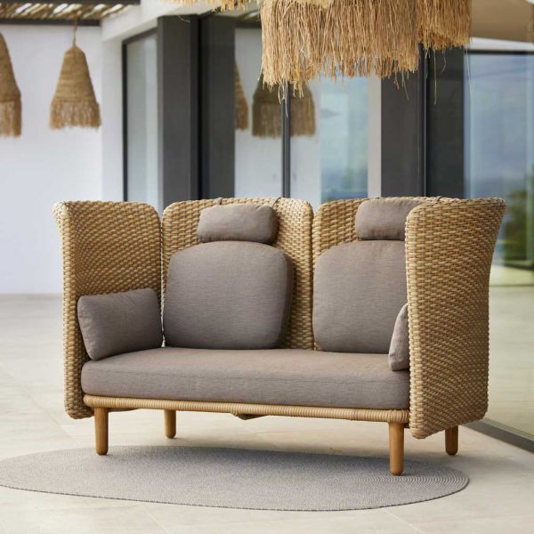 Image of Arch contemporary cane outdoor sofa with high backs and arms by Cane-line