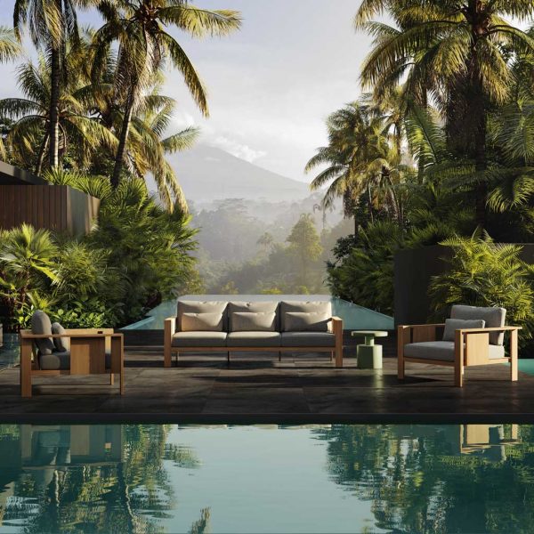 Image of Beam luxury wooden garden sofa and lounge chairs by Oiside, with exotic plants and palm trees in the background