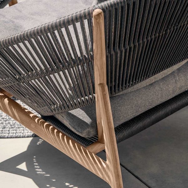 Image of detail of teak frame and synthetic rattan tub seat of Bora outdoor lounge furniture by Gloster