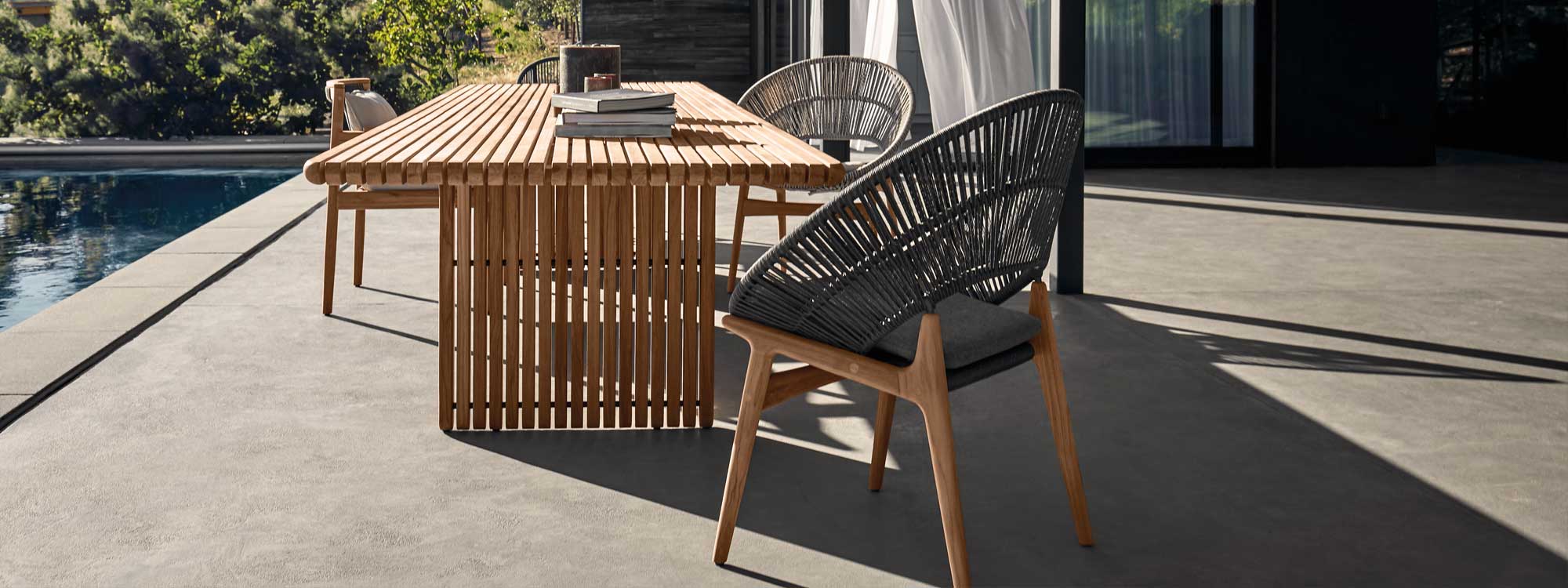 Image of Gloster Deck rectangular teak table and Bora teak & rope tub dining chairs