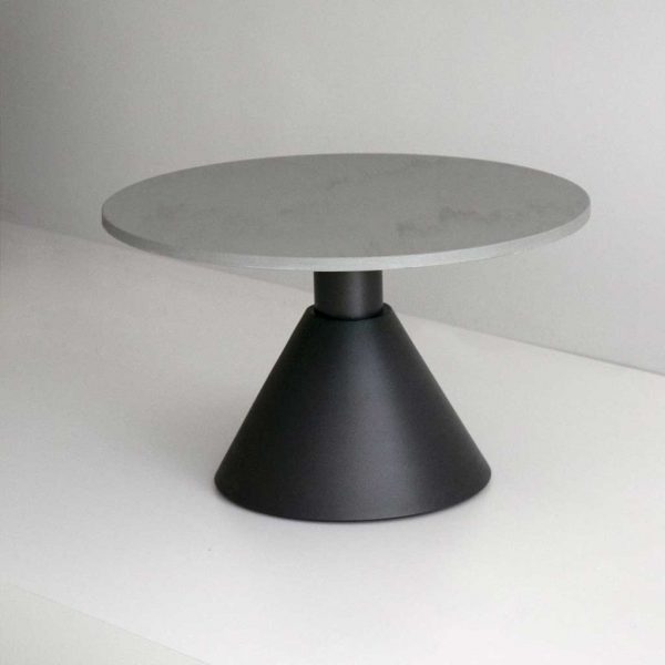 Studio image of Oiside Drums geometric low table with conical base in dark grey aluminium