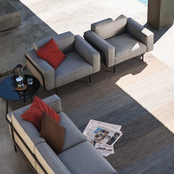 Image of aerial view of RODA Estendo modern garden sofa and lounge chairs on shady terrace on outdoor carpet
