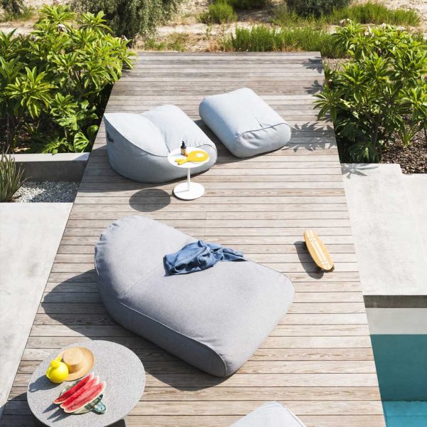 Image of aerial view of RODA Onda exterior bean bag lounge chair and bean bag chaise longue and bean bag ottoman on sunny poolside