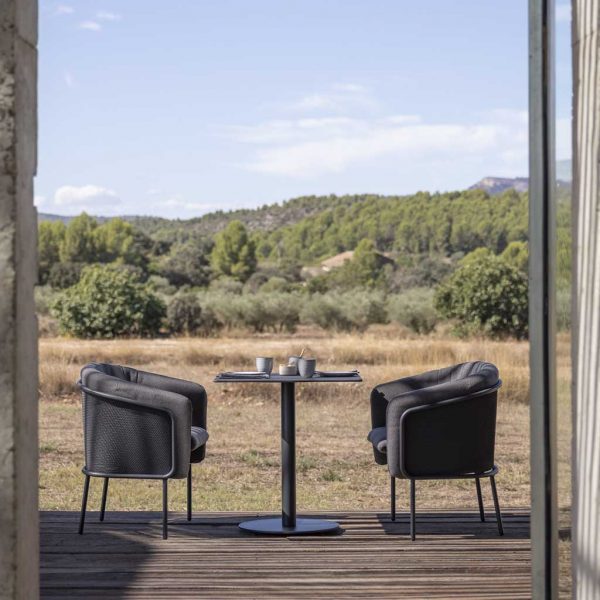 Image of pair of anthracite coloured Slide comfortable garden chairs with Branta small bistro table by Todus