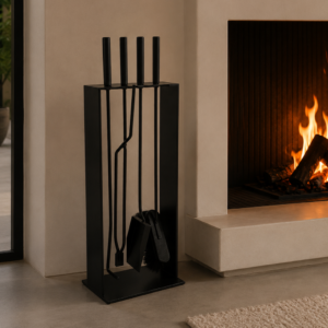 Image of Conmoto Norma fire tools next to roaring fire