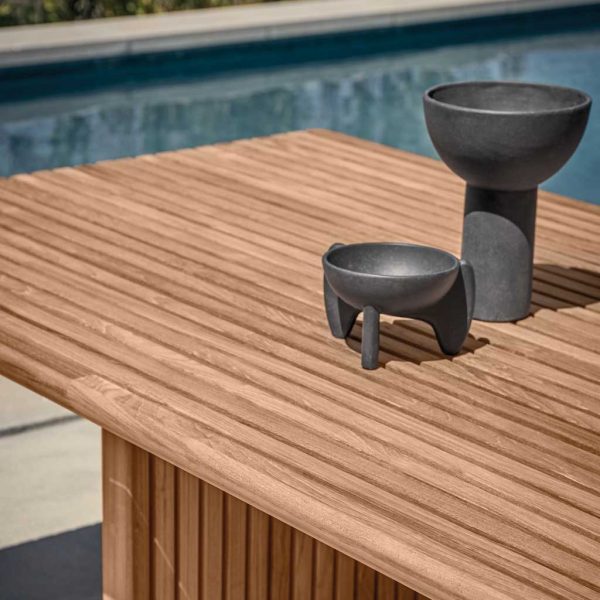 Image of planked teak top of Deck modern garden table by Gloster