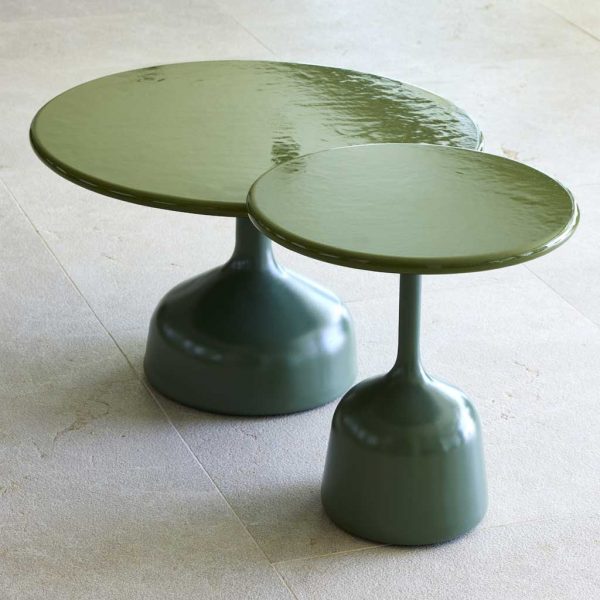 Studio image of pair of Glazed green lava stone side tables by Cane-line