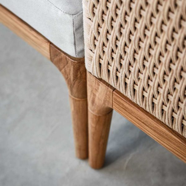 Image of detail of Wheat-coloured synthetic wicker and teak used for Gloster Lima garden sofa