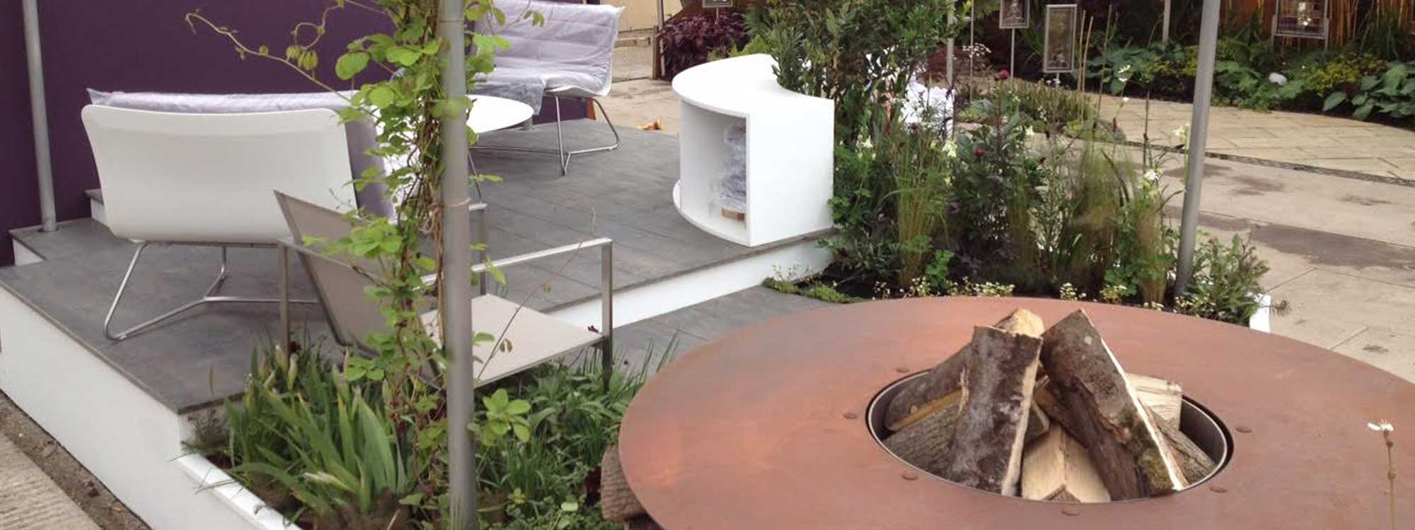 Image of Encompass Furniture stand designed by Charlotte Rowe Garden Design, shown at RHS Chelsea Flower Show.