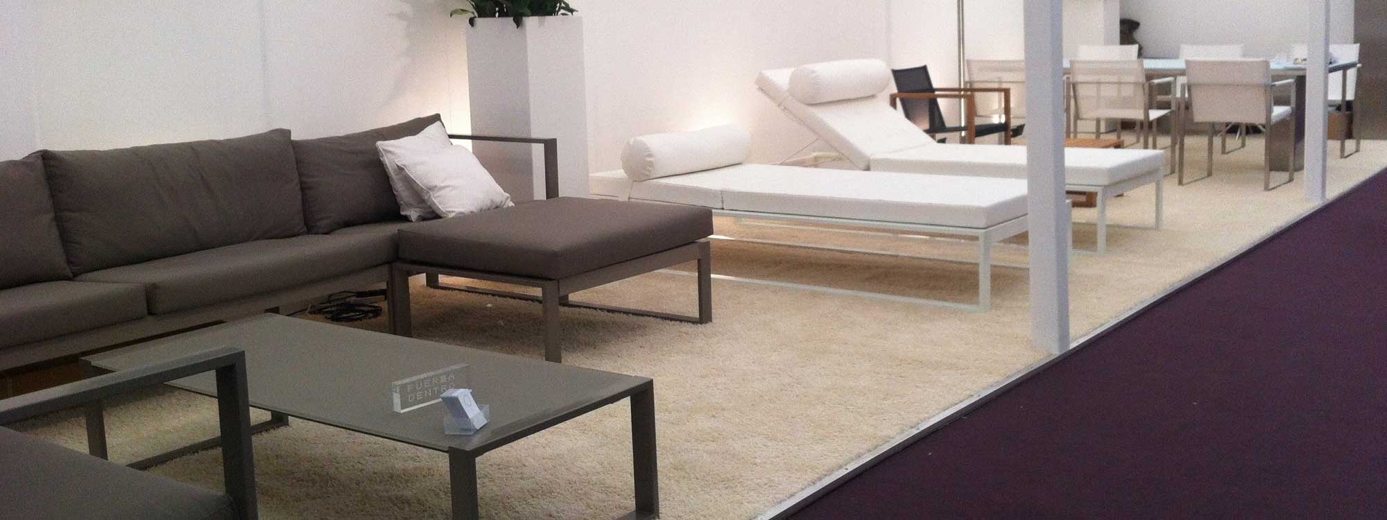 Image of the Encompass Furniture stand at Decorex, including FueraDentro minimalist garden furniture at Decorex, London