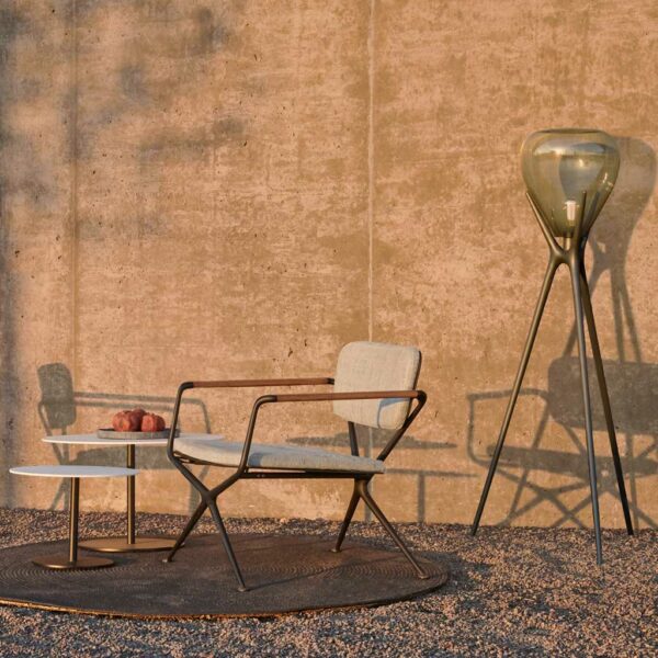 Image of Royal Botania Meduz exterior standard lamp and Exes garden lounge chairs in the late afternoon sun