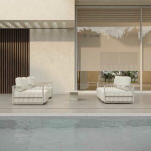 Image of Ava minimalist white garden sofa and lounge chairs by Oiside on tranquil poolside terrace