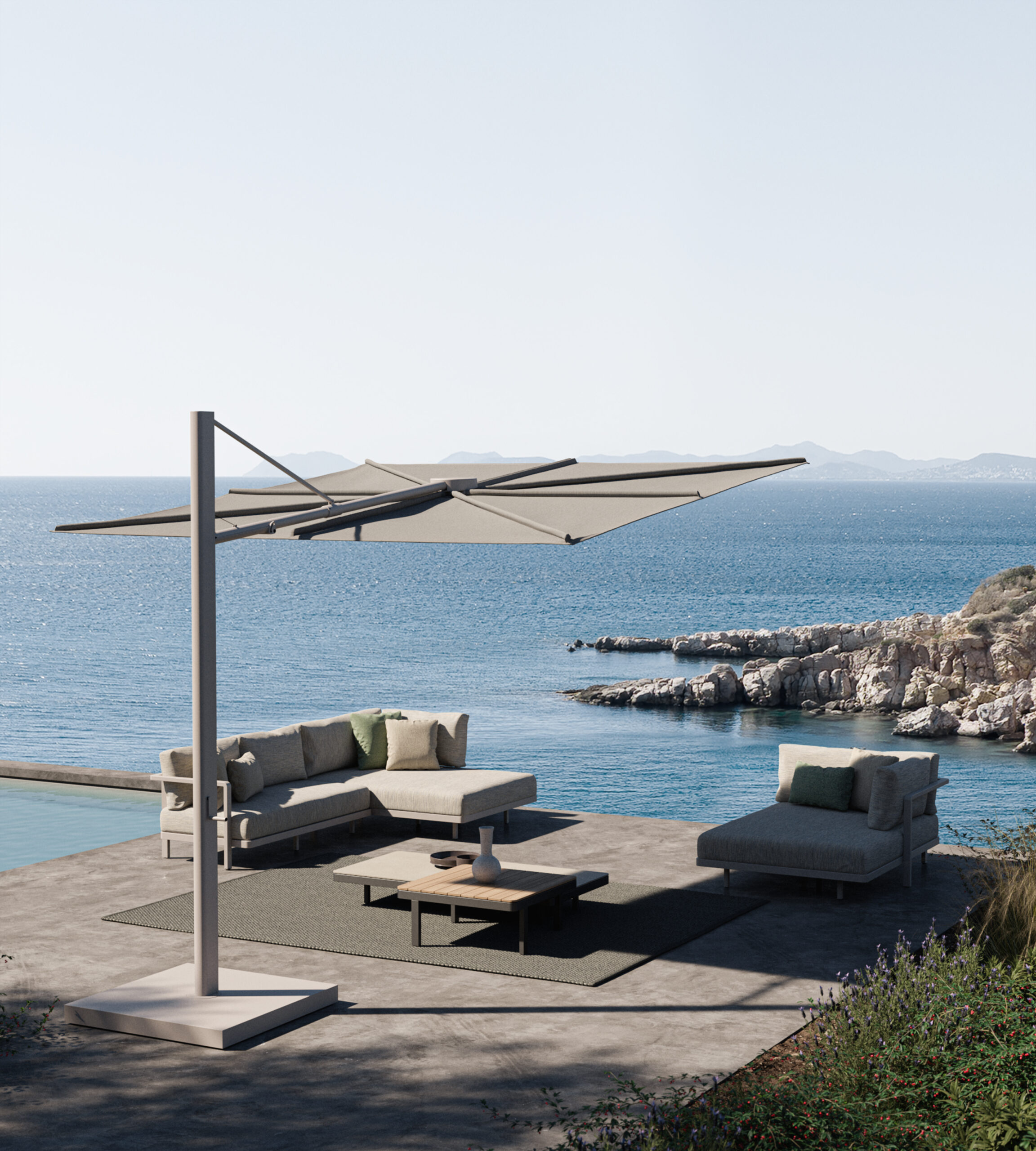 Image of Royal Botania Alura Lounge and Solaz parasol with blue sea and hazy sky in ther background