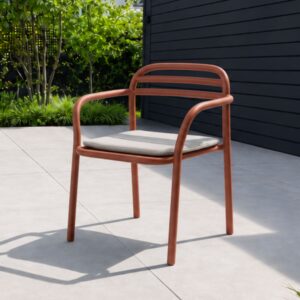 Image of Cane-line Bliss garden dining armchair on sunny terrace