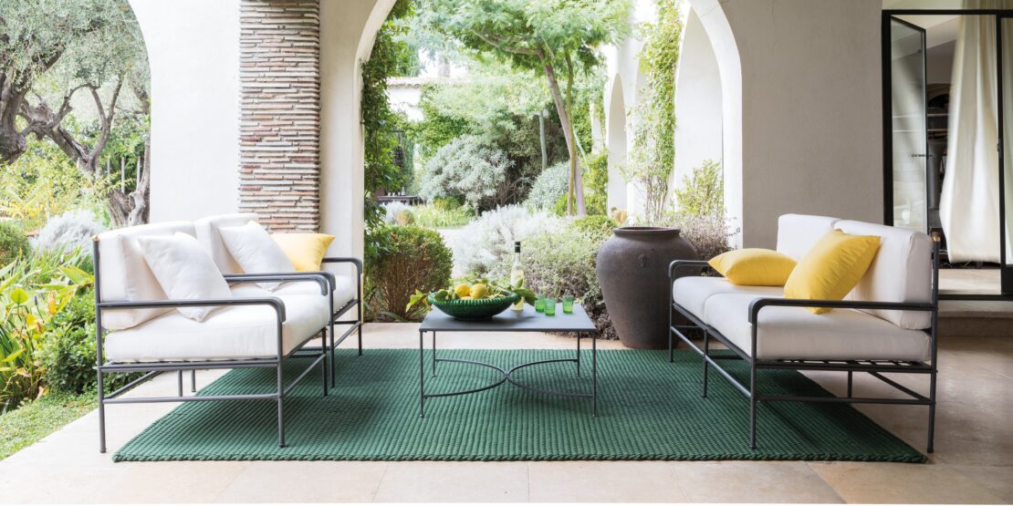 Ambient image of Unopiu Toscana classic steel garden sofa and lounge chairs