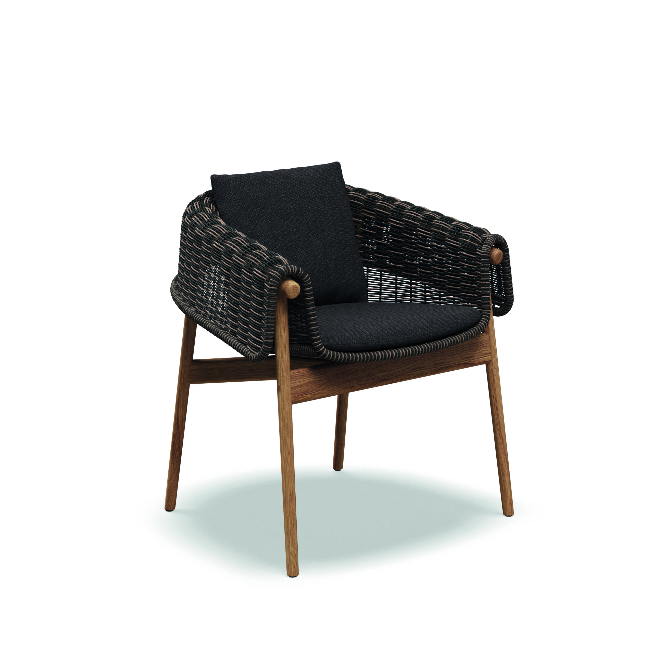Studio image of Gloster Wrap dining chair in Umber wicker and teak