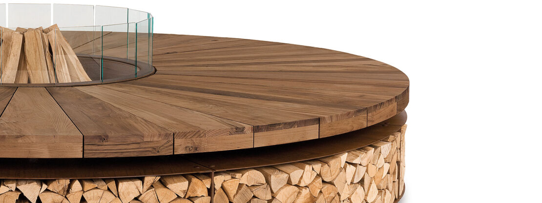 Image of chestnut surround and smoked glass fire screen panels of Artu modern firepit by AK47 Design, Italy.