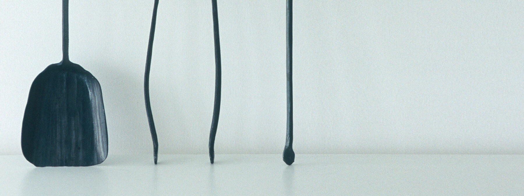 Studio image of A Ferro E Fuoco Italian Hand-Forged Fire Tools made in recycled railway track using 500 year-old water-powered hammer