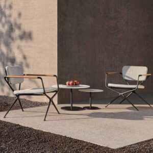 Image of pair of Royal Botania Exes low chairs and Butler coffee tables